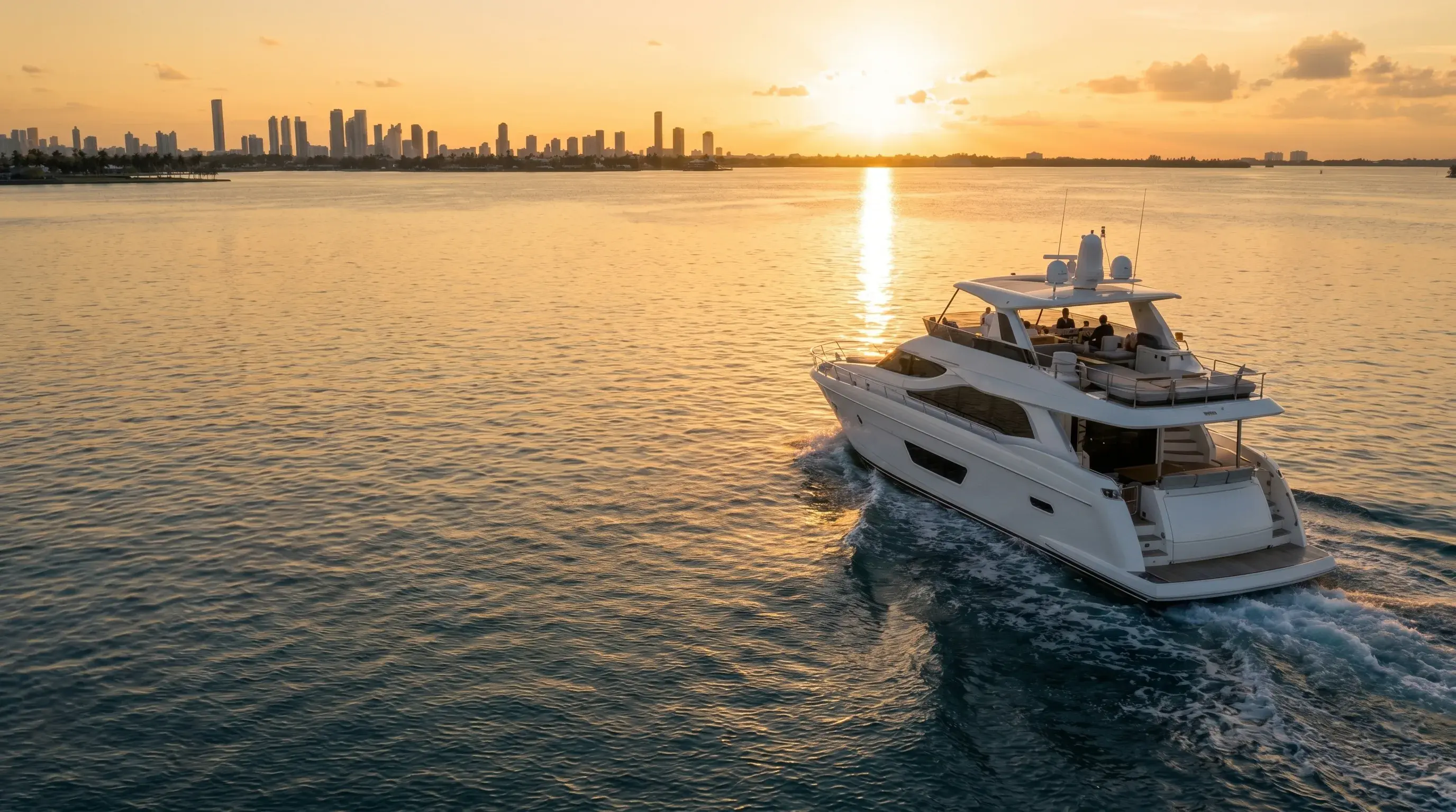 Yacht charter Miami sunset. LIMITLESS YACHTS